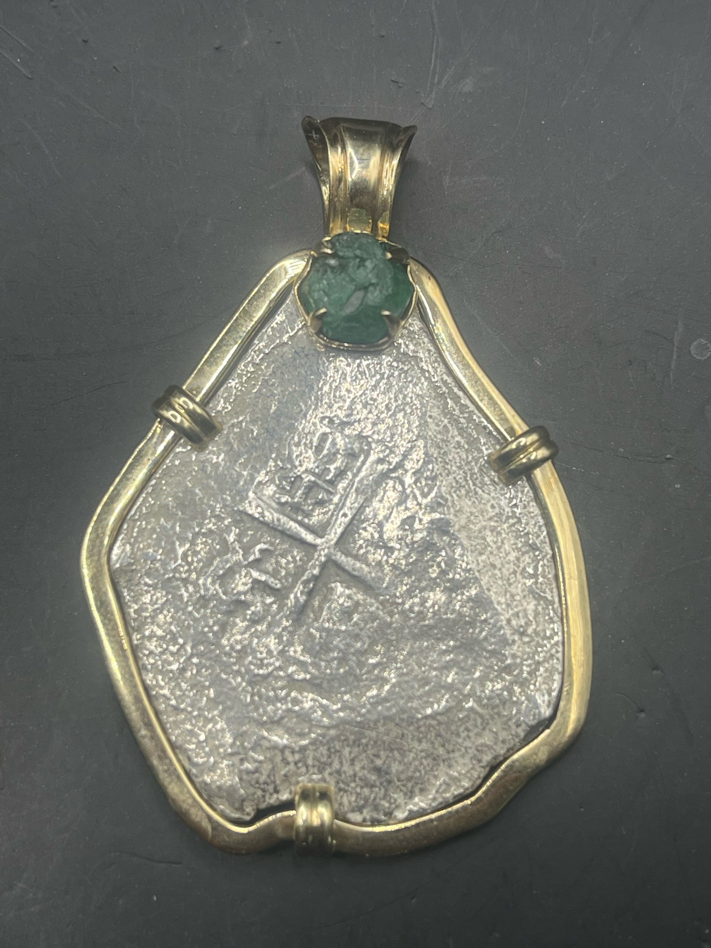 1715 Fleet 8 Reale in 14kt Mount with Large Fleet Emerald. Grade 2, 29.8 Grams total, J Assayer, Mexico City Mint, Philip V Reign, 2.55 Carat Emerald, Cobb Coin Co. Cert, Salvaged by John Brandon.